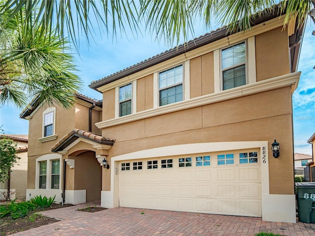 view of front of property featuring a garage