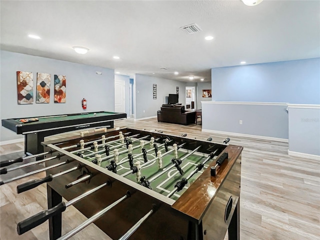 recreation room with pool table and hardwood / wood-style floors