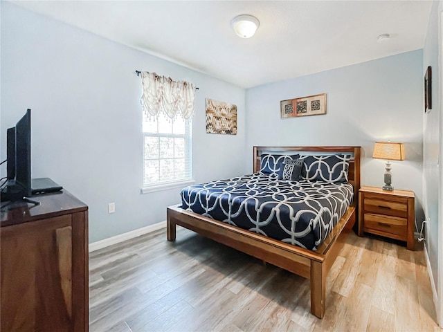 bedroom featuring light hardwood / wood-style floors