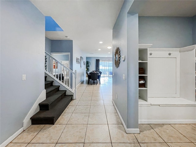 interior space with light tile patterned floors