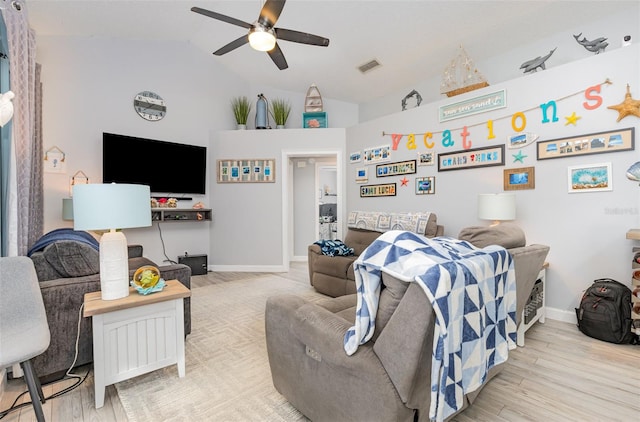 living room featuring high vaulted ceiling, ceiling fan, and light hardwood / wood-style floors