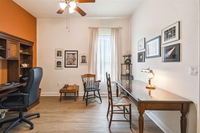 office area featuring hardwood / wood-style floors and ceiling fan