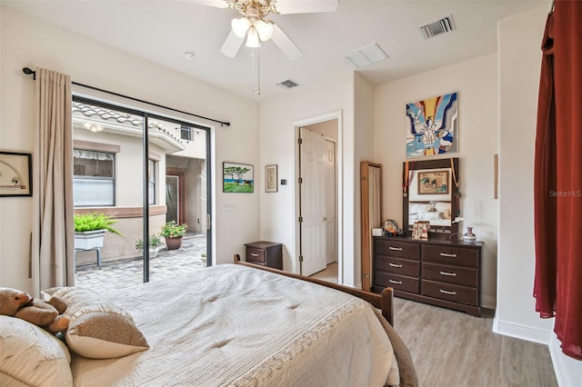 bedroom featuring ceiling fan, light hardwood / wood-style floors, and access to outside