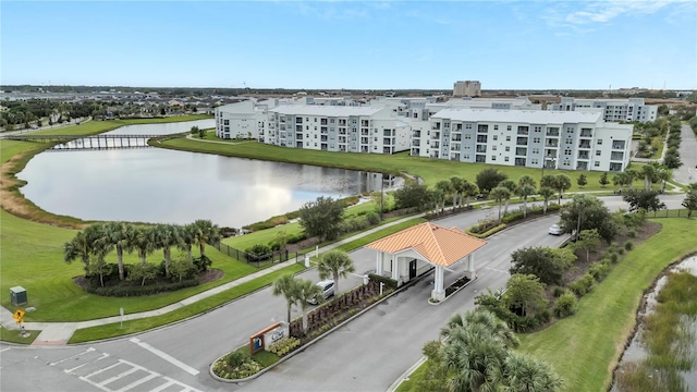 birds eye view of property with a water view