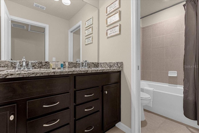 full bathroom featuring shower / bath combo with shower curtain, toilet, and vanity