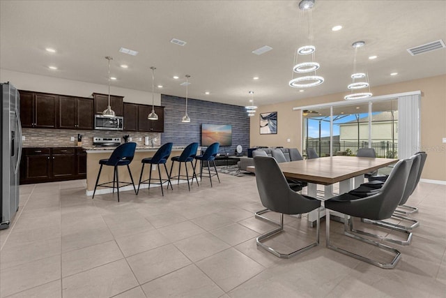 view of tiled dining space