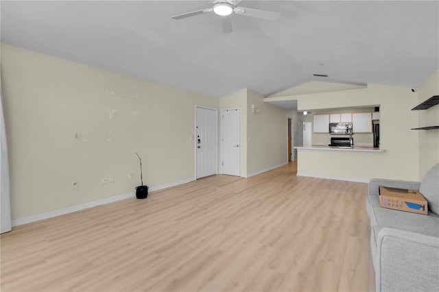 unfurnished living room with light wood-style flooring, vaulted ceiling, visible vents, baseboards, and ceiling fan