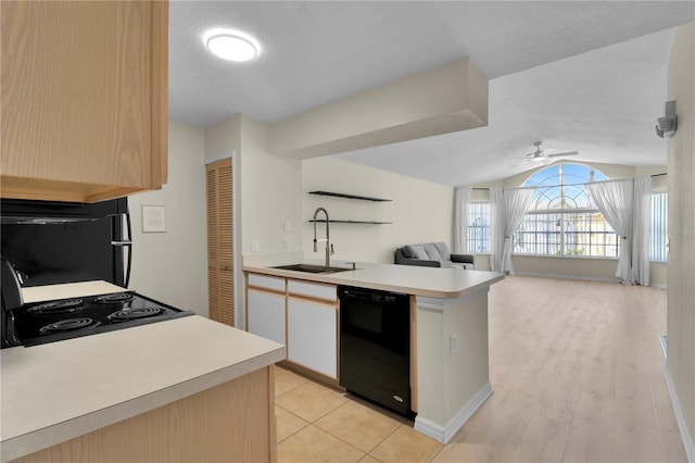 kitchen featuring light countertops, a ceiling fan, a sink, black dishwasher, and electric range oven