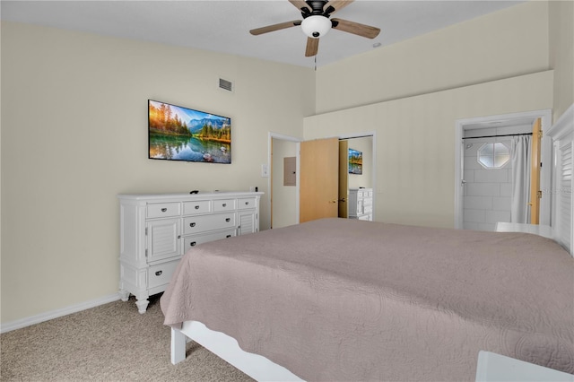 bedroom featuring light colored carpet, baseboards, a ceiling fan, and visible vents