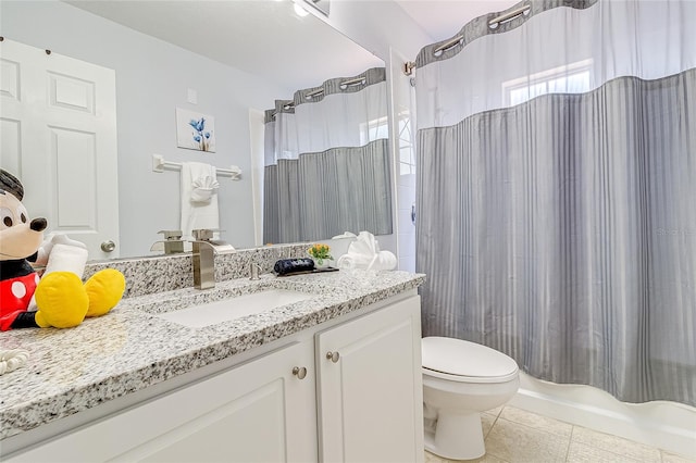 full bathroom featuring vanity, toilet, tile patterned floors, and shower / bathtub combination with curtain