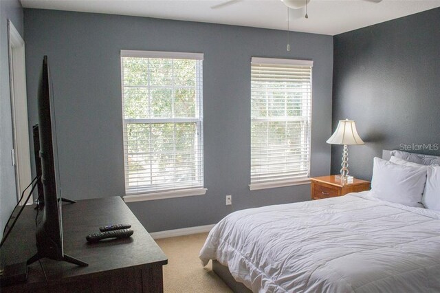 bedroom featuring carpet and ceiling fan