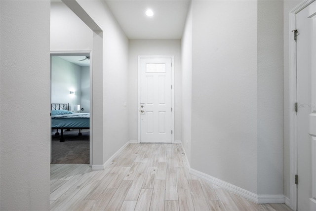 hallway featuring light wood-type flooring