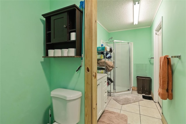 bathroom featuring tile patterned flooring, crown molding, a textured ceiling, toilet, and a shower with shower door