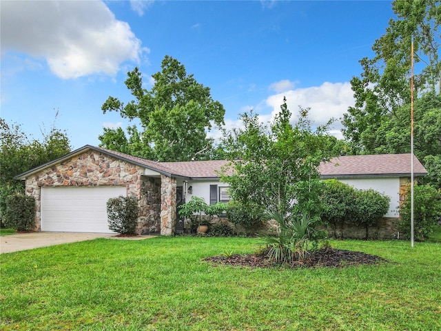 ranch-style home with a front yard and a garage