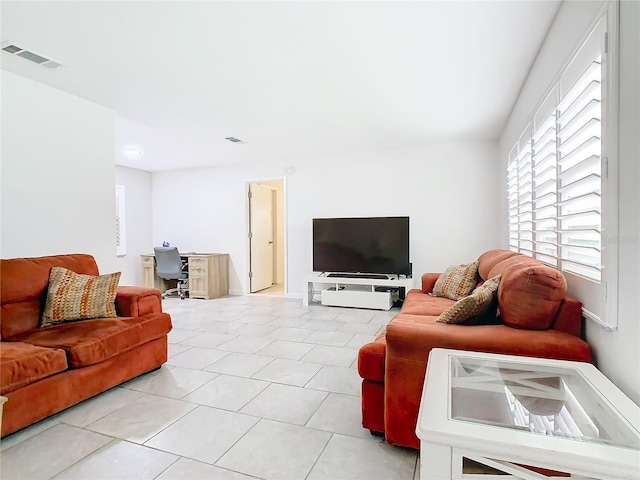 living room featuring light tile patterned floors