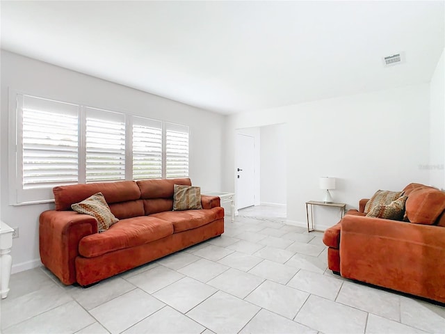 living room featuring light tile patterned floors