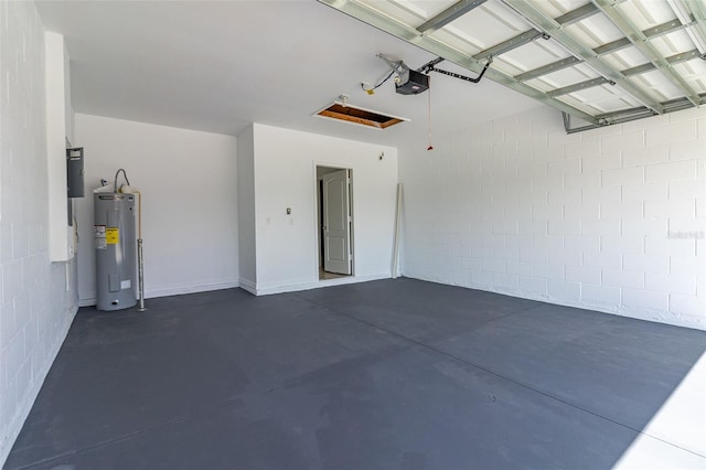 garage featuring water heater and a garage door opener