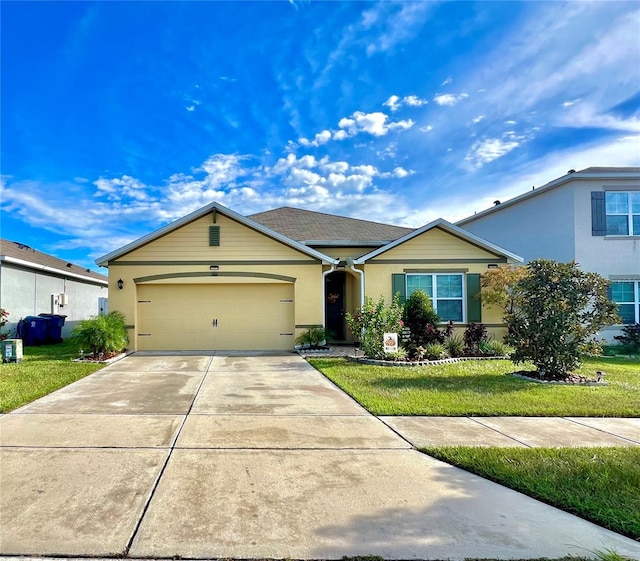 ranch-style home with a front lawn and a garage