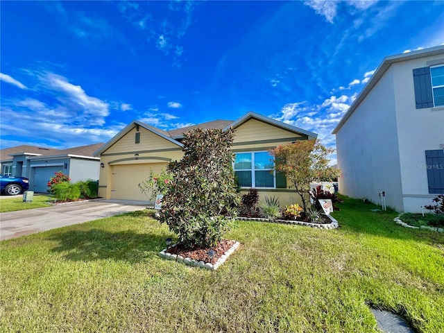 view of front of property with a front yard and a garage