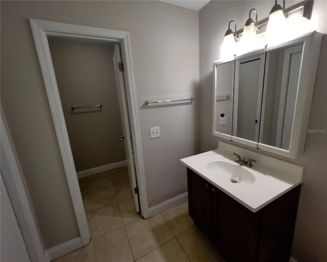 bathroom with vanity and tile patterned floors