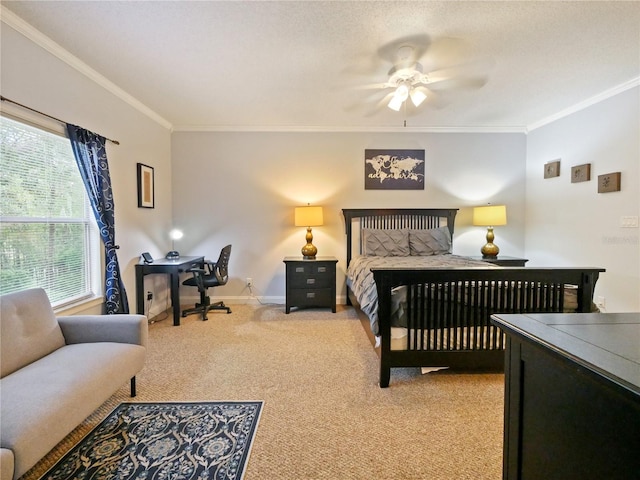 bedroom with carpet flooring, ceiling fan, crown molding, and a textured ceiling