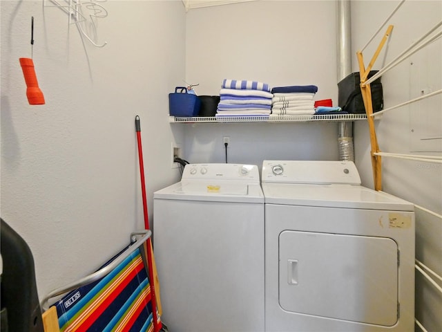 laundry area with washer and clothes dryer