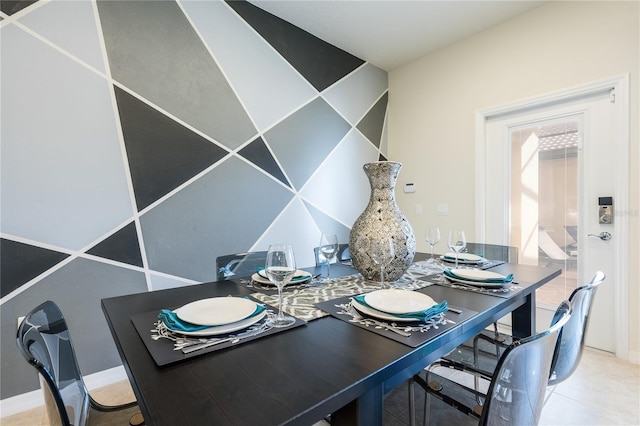 dining room with tile patterned flooring