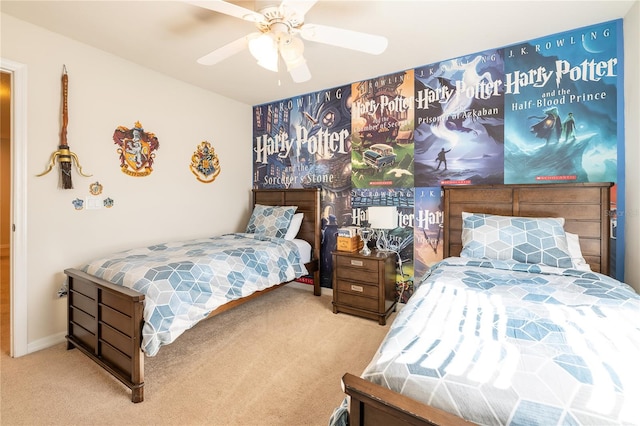 bedroom featuring light carpet and ceiling fan