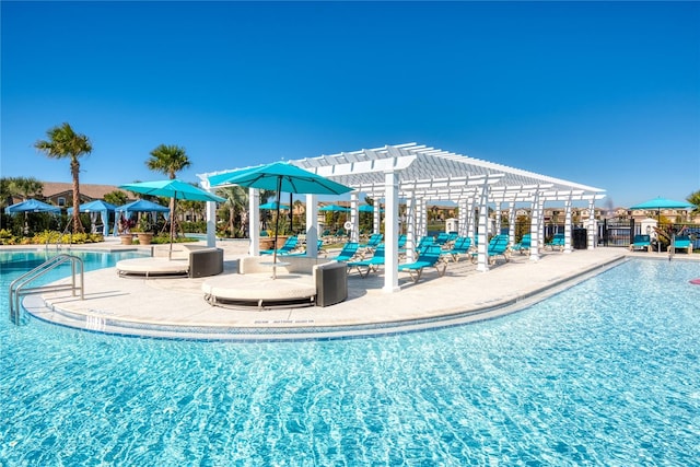 view of swimming pool featuring a pergola