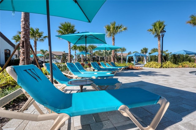 view of play area with a patio area and a gazebo