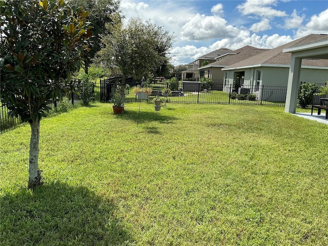 view of yard with fence