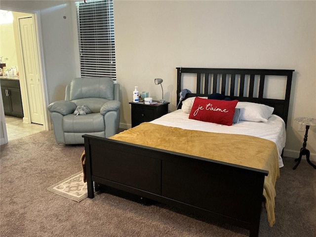 4183 Cortland Dr, Davenport, FL 33837 - bedroom featuring carpet floors, baseboards, and ensuite bath