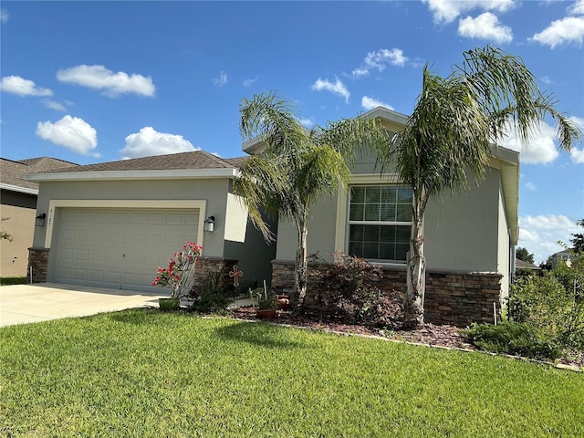 4183 Cortland Dr, Davenport, FL 33837 - view of front of home featuring an attached garage, a front lawn, and stone siding