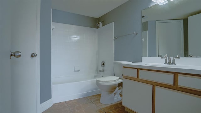 bathroom with tile patterned flooring, toilet, vanity, and bathing tub / shower combination