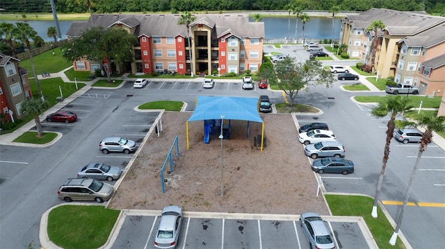 aerial view with a residential view and a water view