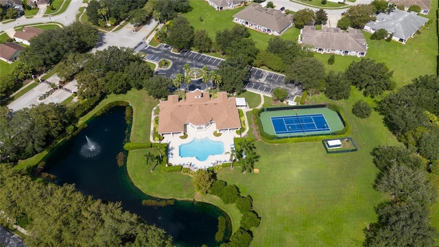 bird's eye view with a water view and a residential view