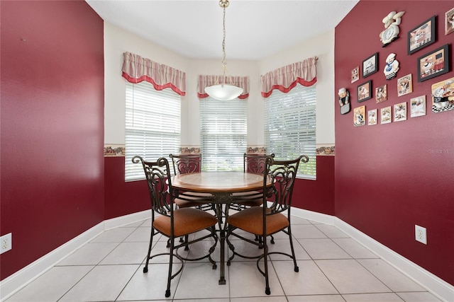 tiled dining space with plenty of natural light