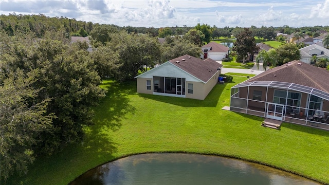 drone / aerial view with a water view