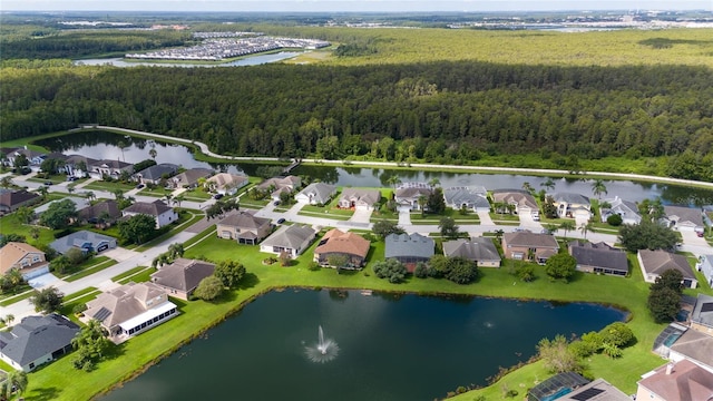 birds eye view of property featuring a residential view and a water view