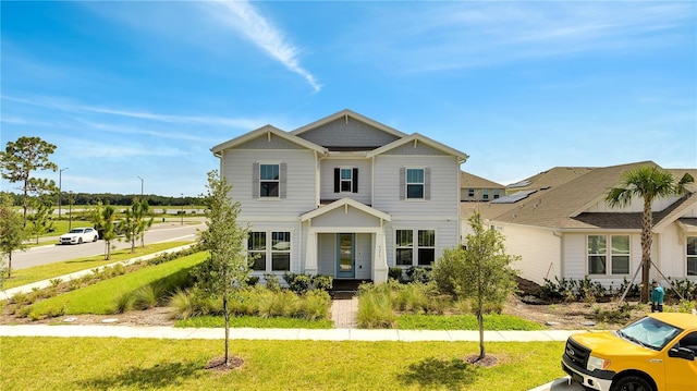 view of front of home with a front yard