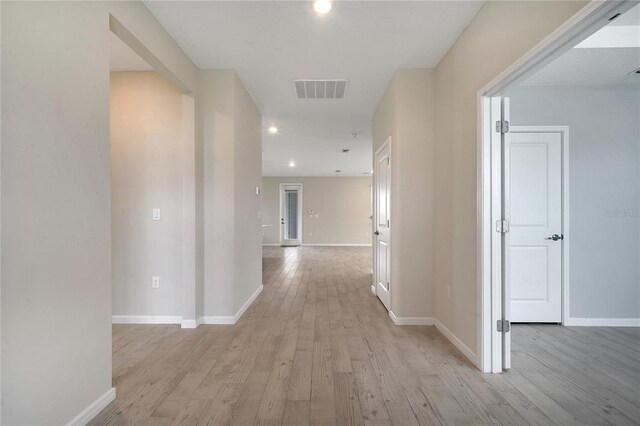 hallway featuring light hardwood / wood-style floors