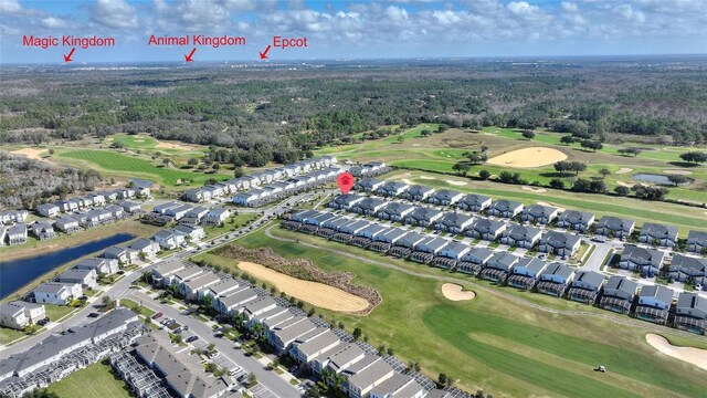 bird's eye view featuring a residential view, view of golf course, and a water view