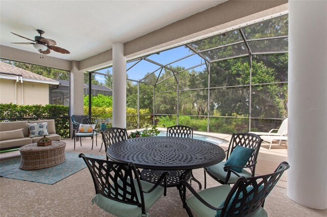 view of patio featuring ceiling fan, a lanai, and an outdoor hangout area