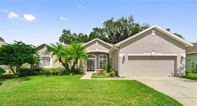 ranch-style house featuring french doors, stucco siding, concrete driveway, an attached garage, and a front yard