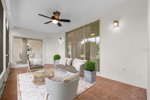 interior space featuring ceiling fan