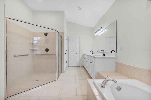 bathroom featuring tile patterned flooring, vanity, plus walk in shower, and lofted ceiling