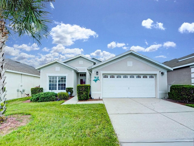 single story home with a front lawn and a garage