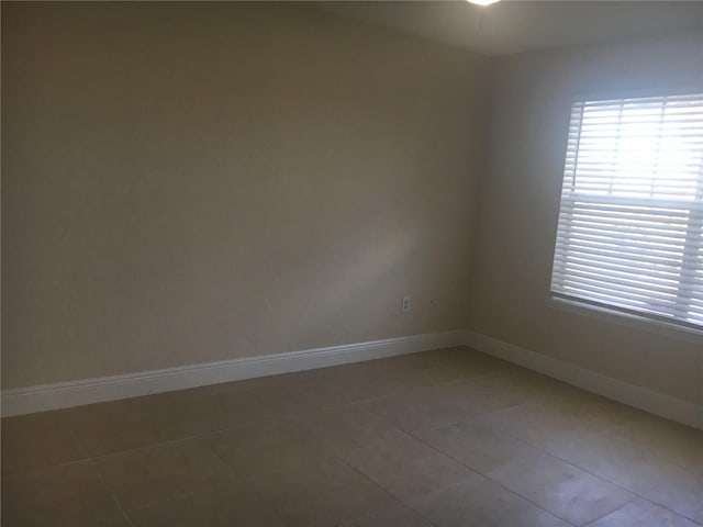 view of tiled spare room