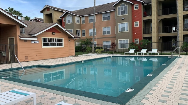 view of pool featuring a patio area