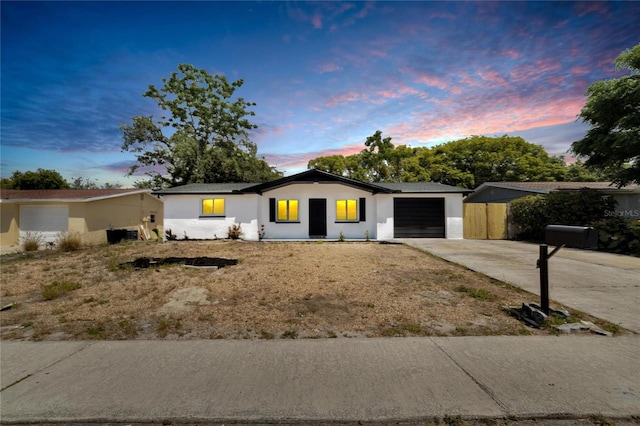 ranch-style home with a garage